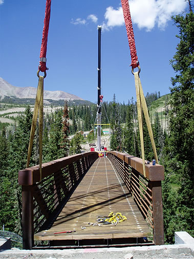 Crane placing a bridge
